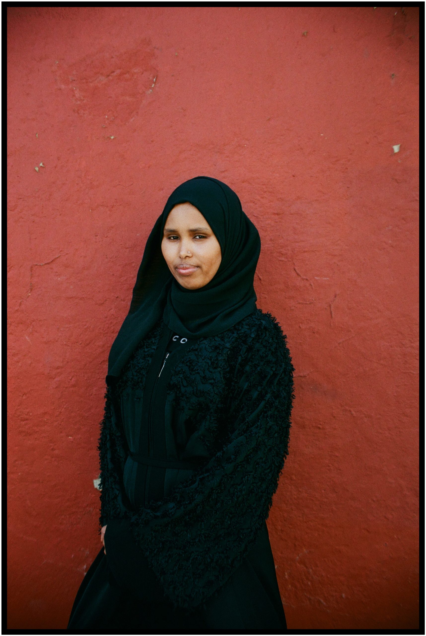 Heaven Lies At Thy Mothers Feet bu Faatimah Allie and Ya’eesh Dollie 8_Hijabi mother woman in black